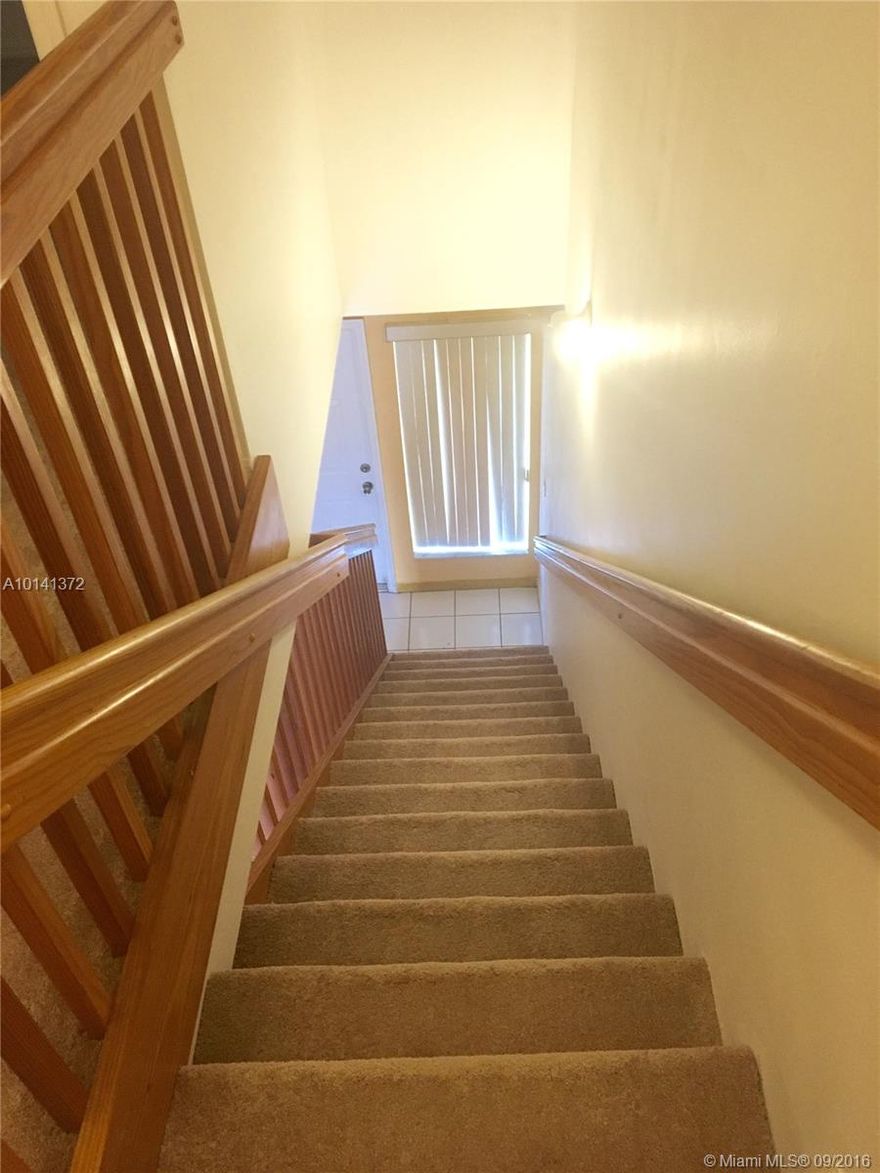 Two story gorgeous town home in a guard gated community with the split floor plan, Mediterranean style, fresh paint, brand new 14 SEER air conditioning unit, brand new carpet on the second floor and tiled on the first floor, washer and dryer in the unit, two pools available on the community grounds. Close to I-95, Aventura mall and much more!