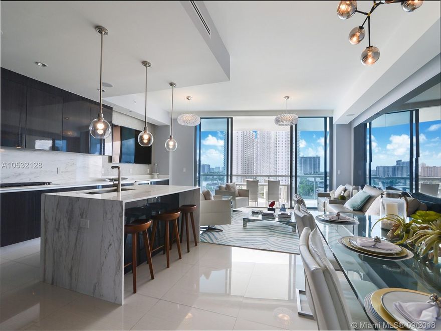 2 Private Elevators lead you to the front door of your beautiful fully furnished waterfront home. This 3 bedroom, 4.5 bath luxury home comes w/ a service suite, smart home technology, & top of the line appliances. Furniture from Artefacto and Addison House. Go outside to your summer kitchen on your spacious terrace while looking at unobstructed views of the intracoastal waterway, the city, & the Atlantic Ocean.