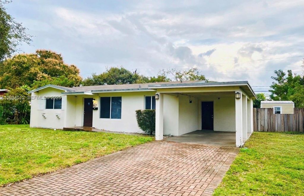 Photo of 1761 NW 27th Ter, Fort Lauderdale, FL 33311 (MLS # A11934012)