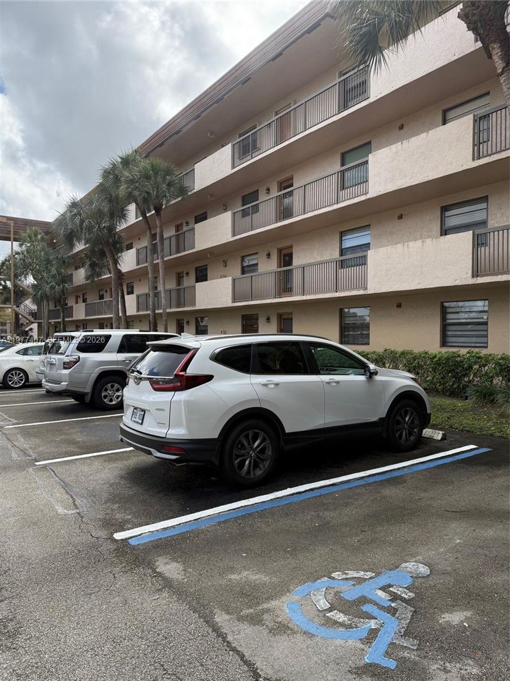 Photo of 4940 E Sabal Palm Blvd #203, Tamarac, FL 33319 (MLS # A11977407)