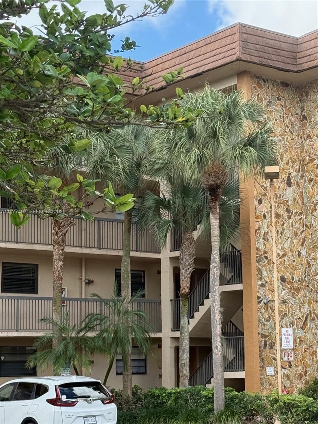 Photo of 4940 E Sabal Palm Blvd #203, Tamarac, FL 33319 (MLS # A11977407)