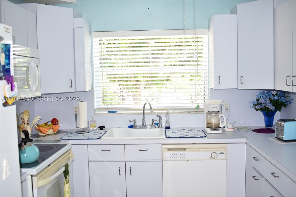 Photo of 9321 Sunrise Lakes Blvd #201, Sunrise, FL 33322 (MLS # A12010540)