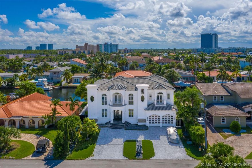 This one-of-a-kind, custom built contemporary estate is located on one of the most coveted canals in Eastern Shores. Situated on 80 ft of water frontage, this property boasts 5,423 sq ft, 7 generous bedrooms, 6.5 bathrooms, and unparalleled finishes that separate this estate from the rest. The home opens into the perfect living space, boasting vaulted 14 ft ceilings, a formal dining area, a beautifully tiled elevator and an open-layout chef’s kitchen with beautiful water views. This home exemplifies classical architecture paired with modern touches that will appeal to a buyer with a desire for quality and a deal that can’t be missed.