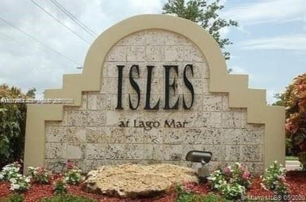 Photo of 12620 NW Vista Isles Dr #1013, Sunrise, FL 33325 (MLS # A12012454)