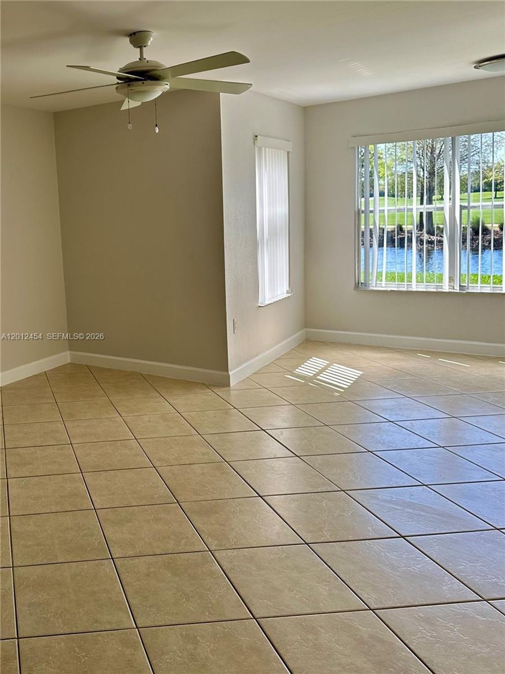 Photo of 12620 NW Vista Isles Dr #1013, Sunrise, FL 33325 (MLS # A12012454)