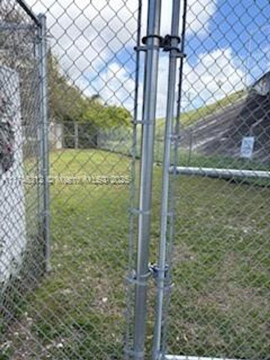 THIS IRREGULAR LOT, IS LOCATED IN THE BACK OF CAMILLUS  HOUSE , UNLOCK THIS POTENCIAL VACANT COMMERCIAL LOT, IT CAN BE USED FOR A NURSERY, FOR STORAGE (DRUGS, FOOD, SUPPLIES, PERFECT FOR RANGE OF NONPROFIT ORGANIZATION JOIN HELPING PEOPLE.