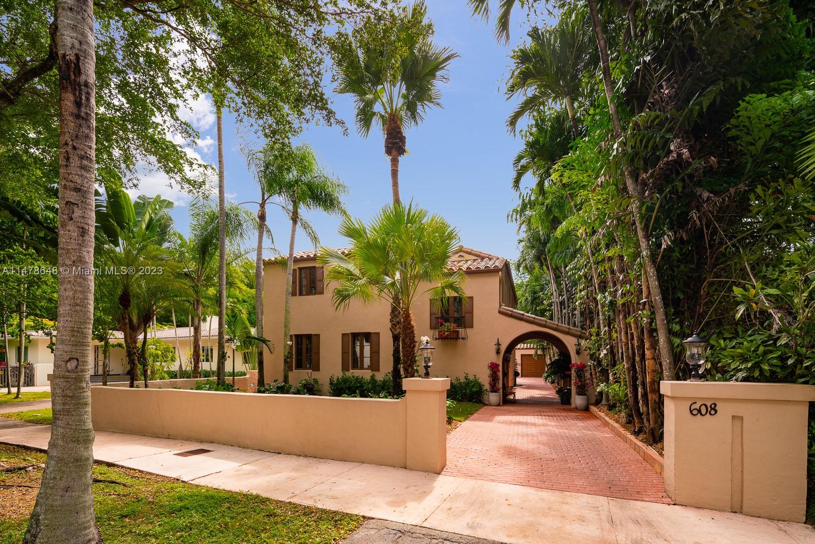 Nestled under a lush canopy in the momentous Italian Village lies this architecturally significant home, created by Alfred Klingbeil and listed in Coral Gables’ Register of Historical Places. Old world character converges with present day functionality, and the result is remarkable. Inspired by 17th century Italian farm houses, the residence was made for entertaining w/ excellent interior social spaces flowing to brilliant alfresco places. Formal living & dining rooms are masterful, bedrooms & closets generously sized, and master suite w/ sitting room & balcony are purely romantic. Other notable features include hardwood floors, impact glass, beautiful archways, wood-burning fireplace, and a guest cottage ideal for office or generational living. The home, property, and neighborhood are A+.