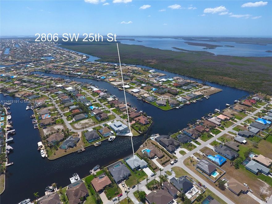 Experience the ultimate in luxury waterfront living with this stunning direct Gulf access pool home! This spacious home also features a den/flex room. The Jenn Air appliances in the kitchen are sure to impress even the most discerning of chefs, and the high-end finishes throughout the home leave nothing to be desired. With 3 full bathrooms, there is plenty of space for everyone to have their own private oasis. The oversize 3car garage offers ample space for your vehicles and additional storage. With southern exposure, you'll enjoy all-day sunshine & breathtaking sunsets. Large, screened lanai perfect place to entertain guests or simply relax and soak up the Florida sun. Take a dip in the sparkling pool or fire up the outside kitchen for a delicious meal under the stars. Direct Gulf access.