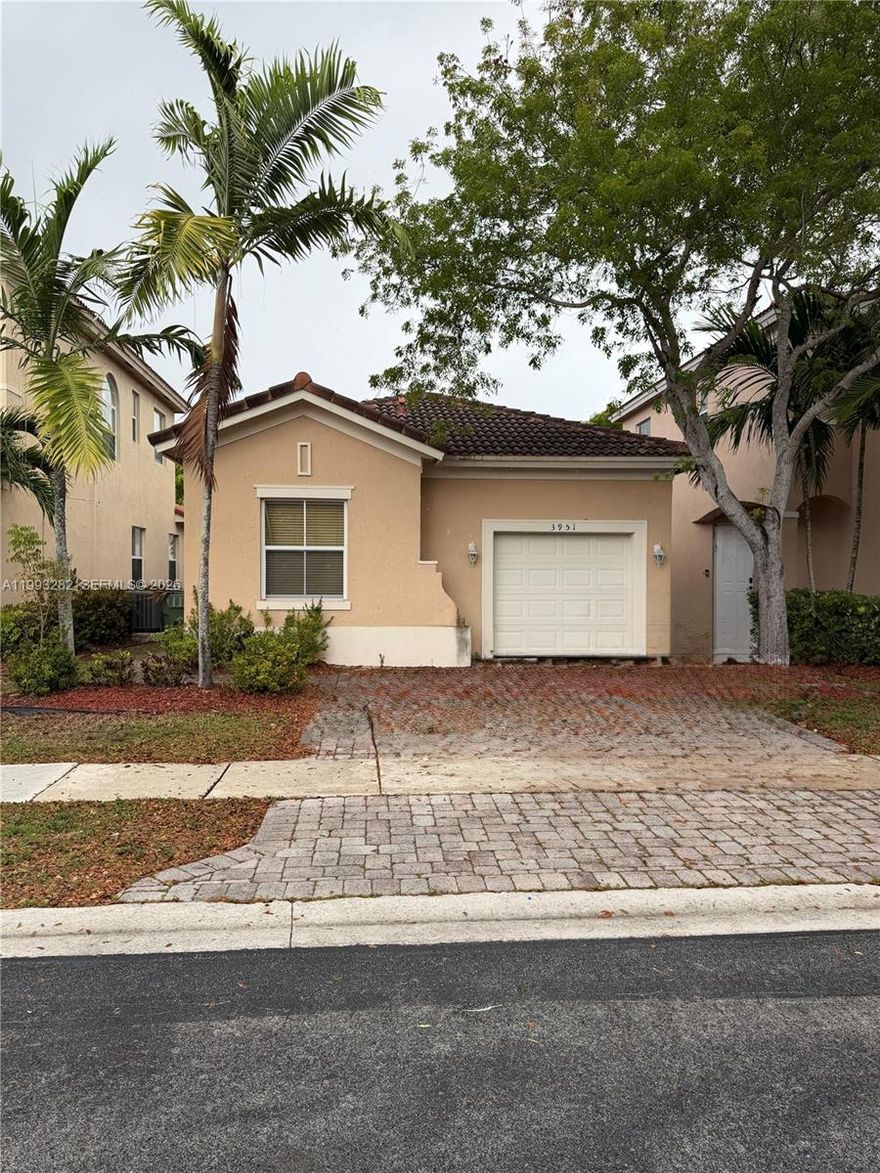 Welcome to Homestead’s Portofino Palms neighborhood in the highly sought-after Waterstone Gated Community—perfectly positioned in the heart of fabulous Homestead with everyday essentials and top conveniences just minutes away. Enjoy quick access to Baptist Hospital, great schools, hotels, shopping, dining, and major highways for easy travel north and south. This spacious, bright 3-bedroom, 2-bath single-story home features laminate flooring, generous living areas, formal dining, and a well-planned kitchen with a breakfast nook, plus an attached garage for secure parking and extra storage, along with 2-car parking driveway for added convenience. Soaring vaulted ceilings up to 15 feet add an airy, open feel, while the large bedrooms offer ample closet space throughout. Step outside to a peaceful backyard and patio—perfect for relaxing, entertaining, or enjoying the Florida sunshine. Don’t wait to schedule a visit to this exceptional home. Make it yours!