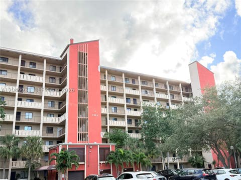Photo of 2206 S Cypress Bend Dr #508, Pompano Beach, FL 33069 (MLS # A12049931)