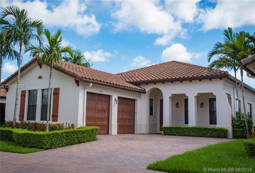 Feast your eyes on this timeless masterpiece. It rests on a private waterfront lot, affording the view of a tropical paradise. The spacious open gourmet kitchen includes over-sized cabinetry and a walk-in pantry. The spacious breakfast nook overlooks the largest water preserve in Cooper City. High impact windows and doors encompass the entire home that is enchanted by 12+ foot ceilings. The five-year old GUARD GATED Monterra community features illustrious amenities including state of the art gym, clover shaped tremendous pool(largest in the entire city), kids splash pad, playgrounds, dog parks, etc.