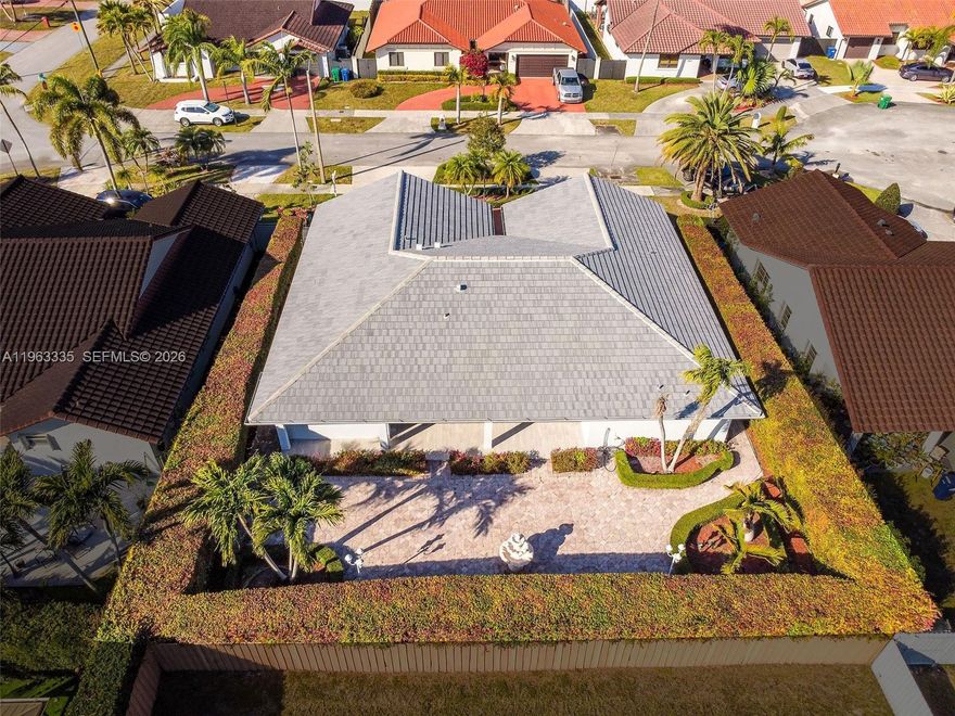 Exquisite home in a desirable cul de sac street with only eight homes.  Lived by two couples without kids. Features a new roof, impact windows and doors, newly installed 24 by 48 ceramic floors. Just minutes from highways, parks, FIU, shopping, hospitals. Beautiful landscaped yard. Spacious two gar garage. Schedule you showing with the owner broker today!