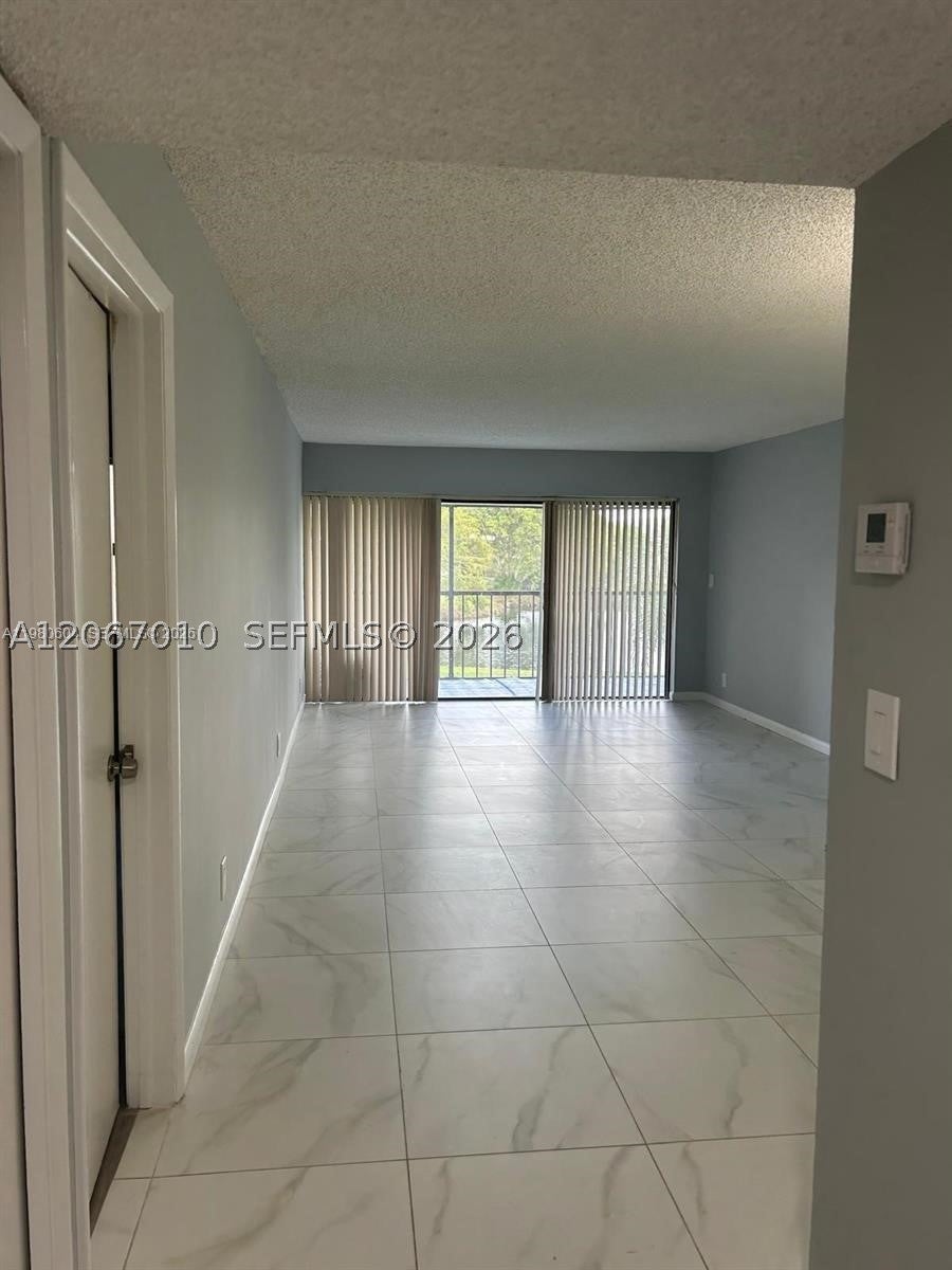 Photo of 230 Lakeview Dr #209, Weston, FL 33326 (MLS # A12067010)
