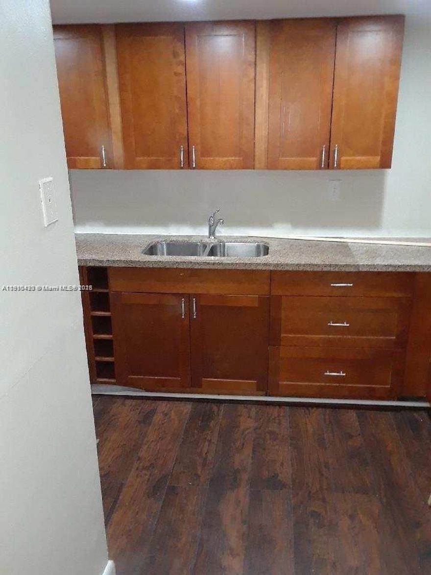 SHOW & RENT! BEAUTIFUL CENTRALLY LOCATED 2/2 WITH WASHER AND DRYER INSIDE THE UNIT, LOCATED CLOSE TO SCHOOLS, SHOPPING, PLACE OF WORSHIP AND ALL HIGHWAYS. THIS UNIT IS TRULY A HIDDEN GEM-A RARE COMBINATION OF LOCATION AND UNBEATABLE VALUE. COMMUNITY IS GATED AND HAS 24 HOURS SECURITY. READY TO MOVE IN!!!