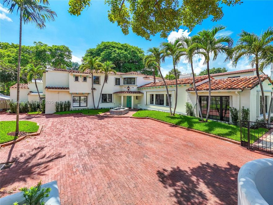 Rare mediterranean estate exuding sophistication and beach vibes in the heart of Miami Beach. Designed by acclaimed architect Carlos B. Schoeppl, this recently updated home is marked with striking original details, living room with cathedral beamed ceilings, fireplace, entertainment room with oak bar, library with soaring ceilings and masterful craftsmanship. The 31,320-SF double-platted corner lot stretching from Flamingo to Pinetree Drive, is secluded with tropical privacy landscape and complete with an immense backyard with lap pool, playground, and space for more amenities. Located minutes to the beach, Bayshore Park, Golf Course, South Beach. Own one of the largest dry lots in MB!