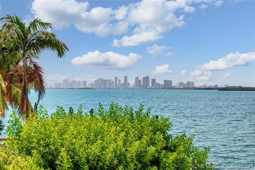 Modern elegance meets Old World Florida charm in this Key West style waterfront home on the guard gated North Bay Island in North Bay Village. Enjoy wide bay & beautiful downtown Miami skyline views and magnificent
sunsets streaming across the water. Built in 1940 the 2 story home features hardwood flooring thru out except the kitchen. There are 3 bedrooms 3 baths in the main house, one being situated on the first floor. Two other bedroom suites are located on the 2nd floor all with views to the water and an expansive terrace looking over the water and downtown Miami. There is a 4th bedroom guest suite on the side of the house with a private entrance. Boat dock and lift, hot tub spa in the backyard, room for a small pool, and manicured grounds.