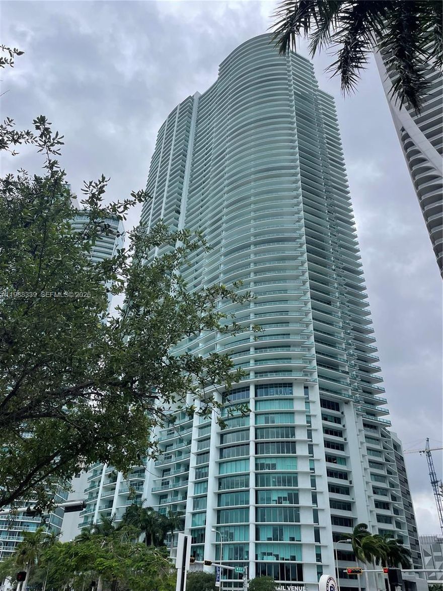 Welcome home! This spacious condo features floor-to-ceiling impact glass, filling the rooms with natural light and showcasing sweeping views of Biscayne Bay and museum park. The sleek, contemporary kitchen is outfitted with European-style cabinetry, premium stainless-steel appliances, and elegant stone countertops perfect for both everyday living and entertaining.
The open-concept layout flows seamlessly into the living and dining areas, complemented by a private balcony ideal for enjoying sunrise views and vibrant city energy. The primary suite offers generous closet space and a spa-inspired bathroom with dual vanities, soaking tub, and glass-enclosed shower.
900 Biscayne is a full-service luxury building offering resort-style amenities including a state-of-the-art fitness center, spa, theater, pool deck, concierge, valet, and 24-hour security. Ideally located across from Museum Park and just minutes from Wynwood, Brickell, and Miami Beach, this residence places you at the center of it all.
An exceptional opportunity to own in one of Downtown Miami’s most iconic addresses. Contact listing agent to schedule your personal showing.