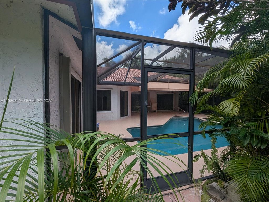 Photo of 5245 NW 58th Ter, Coral Springs, FL 33067 (MLS # A11930812)