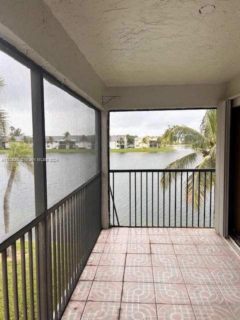 Welcome to this beautifully remodeled 3-bedroom, 2-bath condo, located on the second floor and offering serene views of the large lake from the screened balcony. The open floor plan features stylish tile flooring throughout, creating a seamless flow between spaces. Both bathrooms have been tastefully updated with modern finishes, and the entire condo has been freshly painted, making it move-in ready.
This gated community offers fantastic amenities, including a community pool, basketball courts, and a clubhouse, providing ample opportunities for recreation and relaxation. Perfectly situated for convenient living, this condo is ready for you to call home today