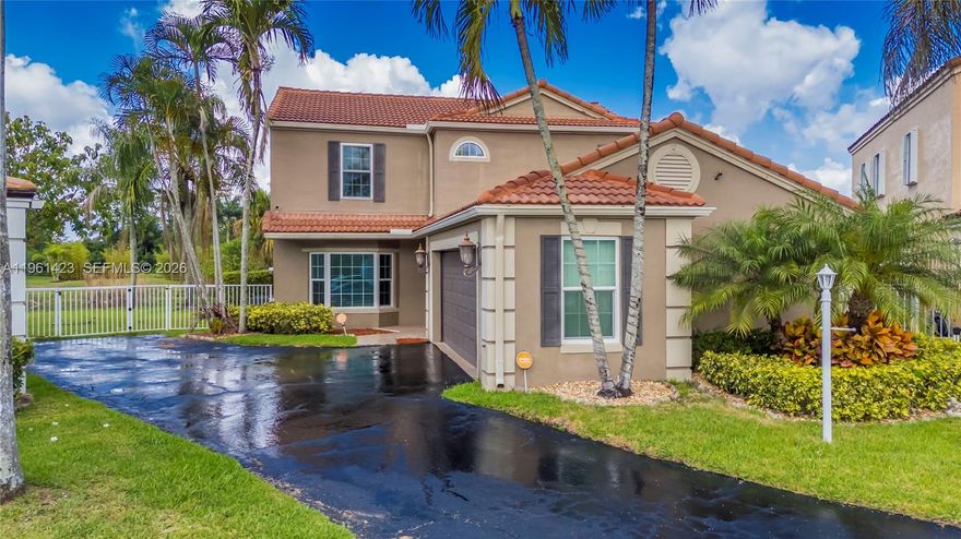 Located on a quiet cul-de-sac in the Boca Chase community, this 4-bedroom, 2.5-bathroom single-family home offers over 2,100 square feet of living space. The layout features all bedrooms on the second floor, including a primary suite with walk-in closet and private bathroom. The main level includes a combined living and dining area, half bath, laundry room, and a renovated, open-concept kitchen with stainless steel appliances and access to the backyard. A screened-in patio provides outdoor recreational space, with a landscaped yard offering additional privacy. The property includes a 2-car garage and sits on an oversized lot measuring approximately 0.9 acres. Boca Chase is a residential community with sidewalks, lakes, and community amenities including tennis courts and a pool.