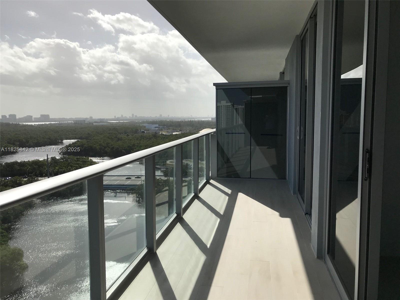 Contemporary Ocean View Living. This 2 bedroom plus den is the best of all worlds. Tile floors, quartz countertops, custom blinds, open kitchen, spacious balcony, floor-to-ceiling windows with ocean views. Enjoy the amenities such as a morning juice bar, gym , dance studio, spa with massage services, library-game area, gathering area , and open WiFi work area, semi-private elevators, beach sun tanning, water sport launch area, and private entry vestibule. The perfect City living building. 1 mile to the beach, 1 mile to the Brightline station, 1 mile to Aventura Mall, Restaurants, and Supermarkets.
