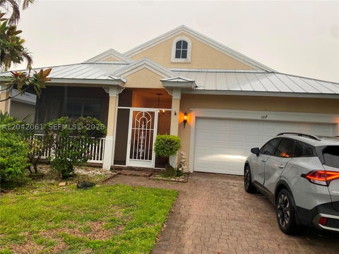 Photo of 107 NW Summerville Ct, Port St Lucie, FL 34986 (MLS # A12042061)