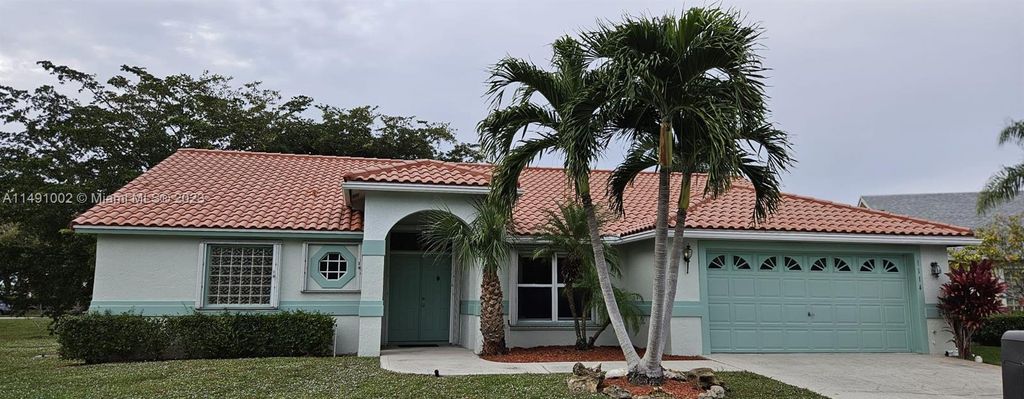 Photo of 1114 Hatteras Cir, Green Acres, FL 33413 (MLS # A11491002)