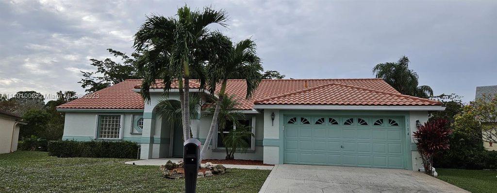 Photo of 1114 Hatteras Cir, Green Acres, FL 33413 (MLS # A11491002)