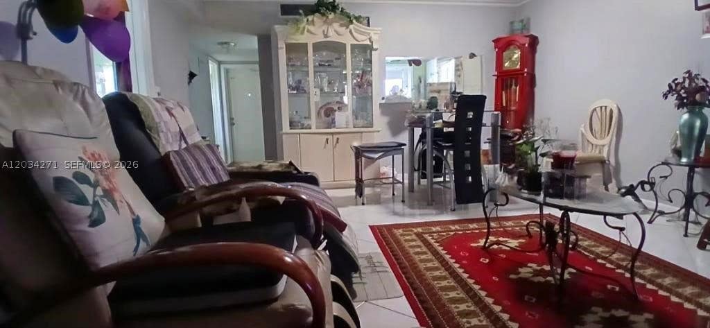 Photo of 4090 NW 42nd Ave #304, Lauderdale Lakes, FL 33319 (MLS # A12034271)