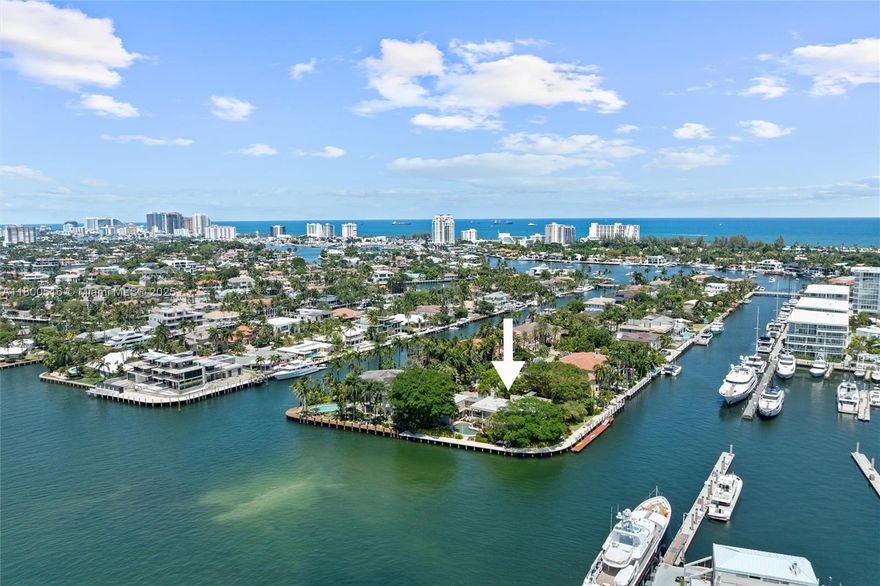 This one of a kind, Intracoastal trophy point lot estate in highly desirable Harbor Beach features up to 8 bedrooms, 6.5 baths, 300+/- feet of waterfront with spectacular views and one of the best docks in Fort Lauderdale.  The marble clad residence plus guest house/captain’s quarters offers dockage for a 100+ vessel on the south side while preserving wide water Intracoastal views on the west side.  5 minutes to Port Everglades Inlet.  Mature banyan trees and tropical landscaping surround the property and give it a private, resort like feel.  The living areas flow seamlessly to the pool and outdoor living spaces and the property is ideally suited for large scale entertaining.  The primary suite features 2 bedrooms and spectacular Intracoastal views.