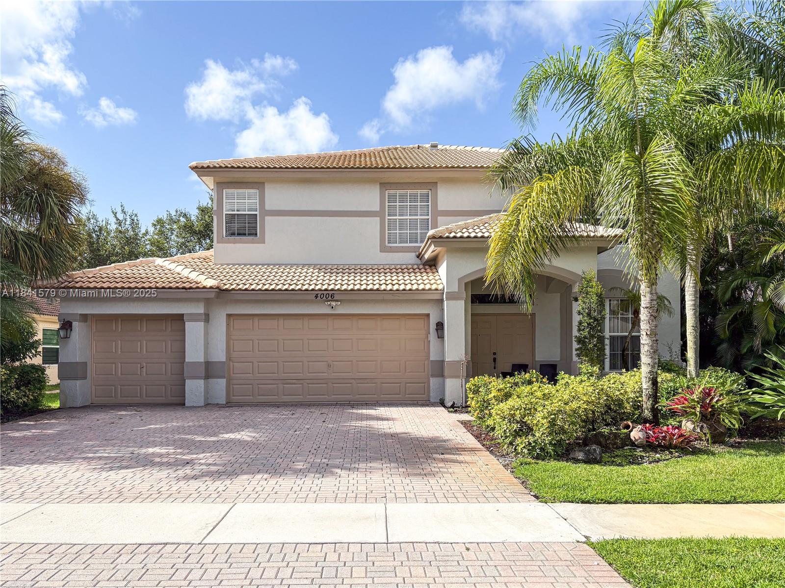Excellent location in gated community with pool and clubhouse. Available for seasonal or annual rental. Upstairs master bedroom features walk-in closet and private sitting area. Master bath includes freestanding Roman tub, separate shower, and double sinks. Balcony overlooks backyard—perfect for enjoying Florida sun. Three spacious bedrooms and two baths upstairs. Hardwood floors throughout second level. Tile and hardwood flooring downstairs. Formal living and dining rooms. Eat-in kitchen with center island.