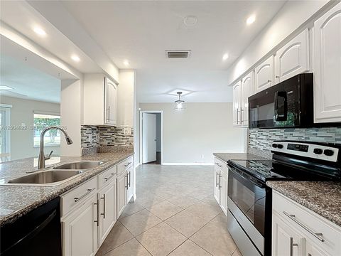 Tiny photo for 8102 NW 96th Ter, Tamarac, FL 33321 (MLS # A12004622)