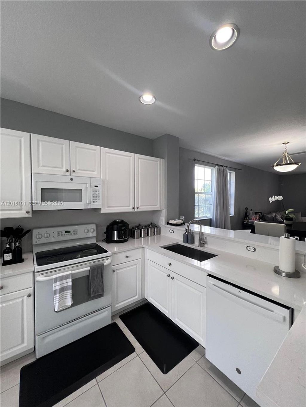 Photo of 681 NW 42nd Ave #-, Plantation, FL 33317 (MLS # A12018101)