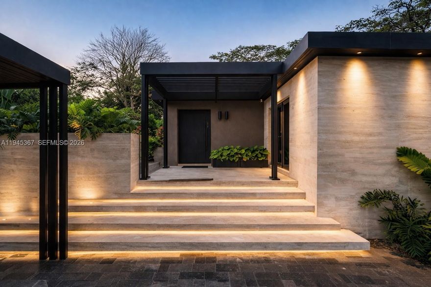 Striking contemporary residence ideally situated in the heart of Coconut Grove, thoughtfully redesigned with an emphasis on quality, design, and privacy. This residence showcases an Italian-crafted kitchen with professional-grade Fulgor Milano appliances, custom MisuraEmme closets, and high-end Effepi R. fixtures throughout. Elegant materials define the interiors, including Turkish Veincut travertine floors, limewashed walls, and sleek VivaPorte architectural doors, creating a refined, cohesive modern aesthetic. Offered with the option to purchase fully furnished for authentic turn-key living. The outdoor environment is equally compelling, featuring multiple curated spaces for entertaining and relaxation. Highlights include Talenti outdoor furnishings, a private firepit lounge, lush new tropical landscaping, and a built-in Italian jacuzzi. Wellness and technology are seamlessly integrated with a Gruppo Tresse spa system, upgraded Buster + Punch lighting, and Sony systems installed in every room.  Fully gated and exceptionally private, the property offers a tranquil retreat while remaining moments from the best of Coconut Grove. With room to add a pool and expand, this is a rare opportunity to own a design-forward home created for elevated modern living.