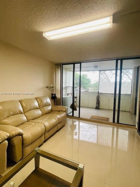 Photo of 8441 Forest Hills Dr #204, Coral Springs, FL 33065 (MLS # A11873784)