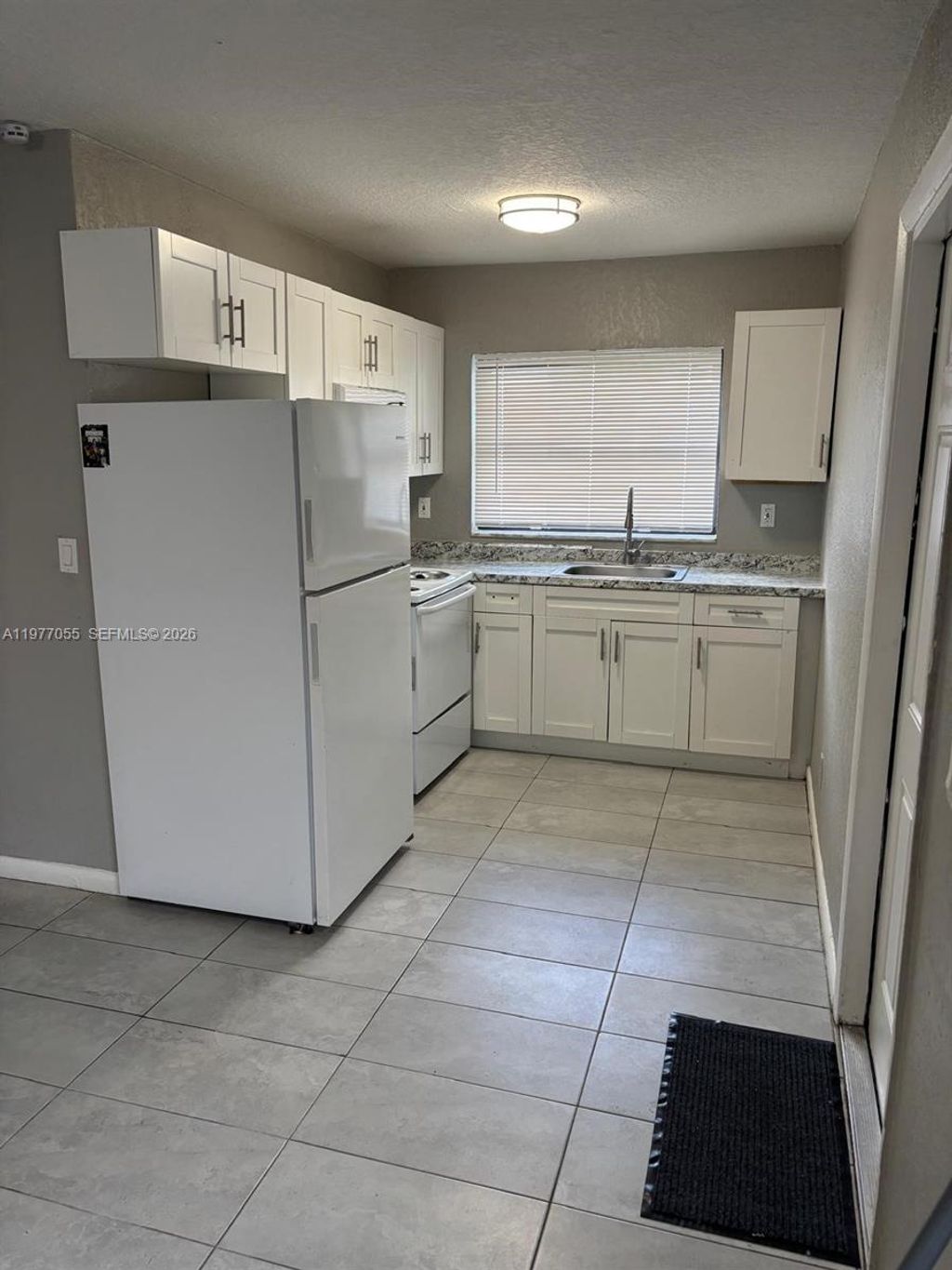 Photo of 931 SW 80th Ave #A, North Lauderdale, FL 33068 (MLS # A11977055)