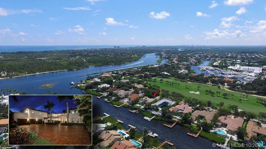Custom waterfront estate home steps from the Intracoastal Waterway. This estate is perfectly situated on the championship golf course in the front yard and waterway and Intracoastal views in the backyard. The home boasts magnificent features throughout including a chef's kitchen which is open to the family room, first floor master suite, hardwood and stone floors, an elevator and impact windows throughout. Guests will enjoy their private space whether it's in an over-sized VIP suite or the mini apartment with a private entrance. Recently updated resort like pool and spa and a large summer kitchen will draw you in to spend time outdoors relaxing or entertaining. This home, in the prestigious Admirals Cove, is sure to impress.
