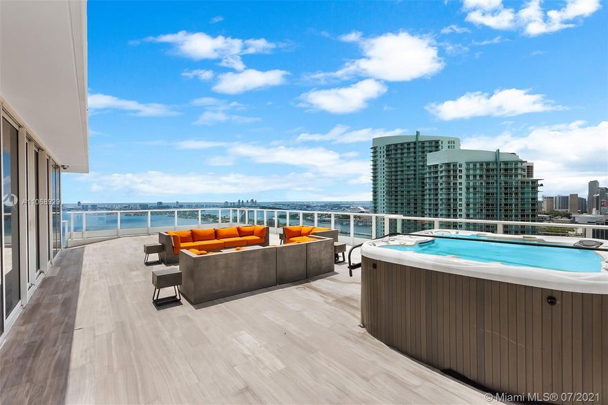 Welcome to PH1 - This exquisitely designed and turnkey furnished condo offers an impressive 180 degrees of unobstructed water & city views, occupying 5350 SF total, with a Jacuzzi on the terrace. Enter directly from the elevator to the foyer and the expansive open floor plan living room, offering a chef's kitchen with Miele built-in coffee system, Stainless steel Wolf/Sub-Zero appliances with Sub-Zero wine-cooler, and Italian marble floors throughout. Watch the sunrise from the large master which is accompanied by a dramatic glass bathroom well equipped with Toto Japanese toilet with ‘Stark and Geesi’ accessories. The fourth ensuite bedroom is a servant quarter located outside of the unit and is easily accessed through the service laundry area. Comes with 3 parking spots & 2 storage units.