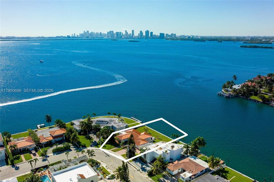 Don't miss out on this rare opportunity to build your dream home on this oversized 17,996 sq. ft. waterfront lot, with 128 ft. of wide bay & downtown Miami skyline views. Located in North Bay Village, central to all that Miami and Miami Beach have to offer, this 3,317 square foot 3 bedroom, 4 bathroom residence provides some of the most breathtaking views in all of the city that can be seen from every area of the home, sitting just one house over from the point. The incredible wide bay views offer marvelous sunsets and the perfect backdrop for entertaining.