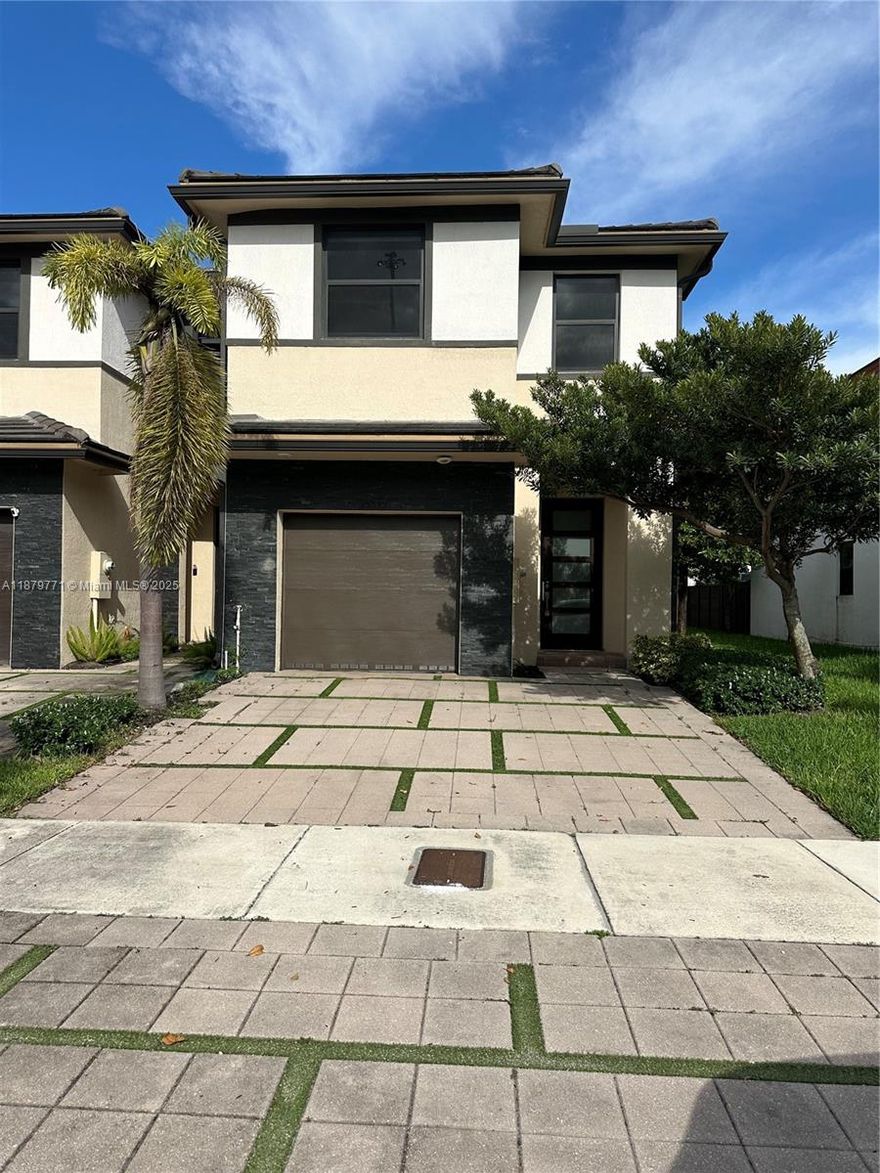READY TO MOVE IN, WITH 2 MONTHS DEPOSIT ONLY!!! Freshly painted and ready to be enjoyed! Step into elegance and comfort in this lovely 3-bed, 2.5-bath home located in Satori, one of Miami Lakes’ most sought-after gated communities. Designed for modern living, this residence features an open-concept layout with a beautifully appointed kitchen, complete with quartz countertops, premium stainless steel appliances, and abundant cabinetry Doors.
Spacious living & dining areas are perfect for entertaining, with a half bath conveniently located on the main level. Upstairs, retreat to the serene primary suite featuring a generous walk-in closet and a spa-inspired en-suite bath. Two additional bedrooms offer flexibility for family, guests, or a home office. Close to mailbox & kids playground