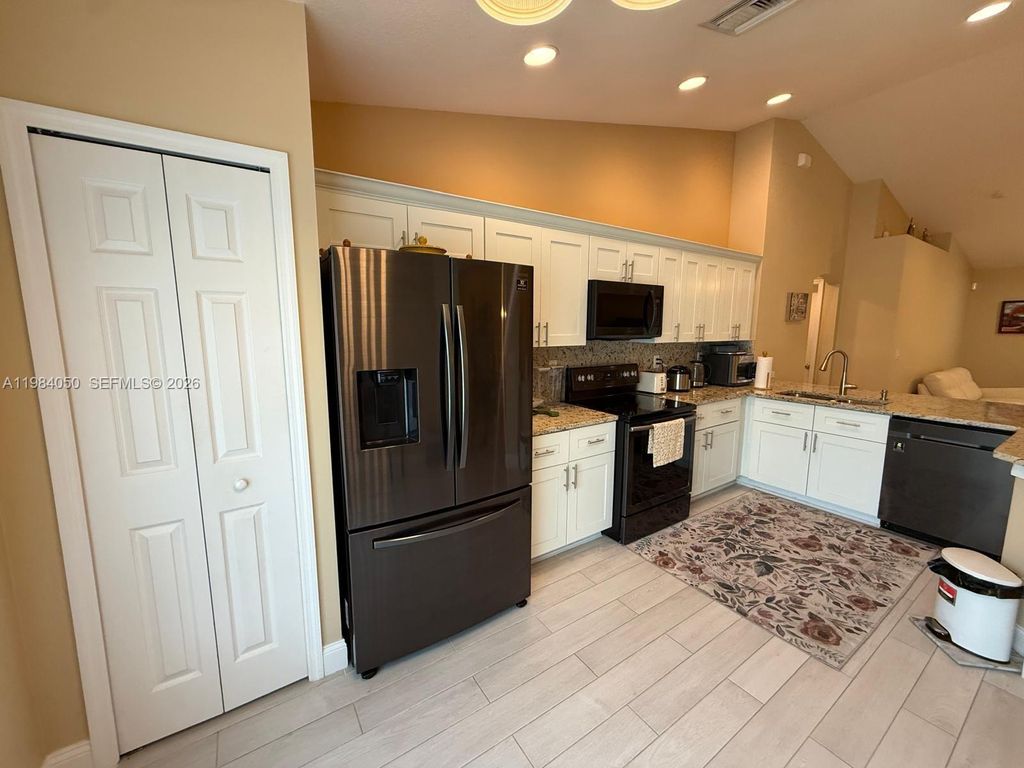 Photo of 5861 NW Cullom Cir, Port St Lucie, FL 34986 (MLS # A11984050)