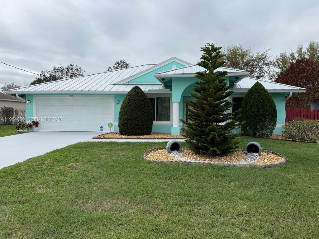 Photo of 5861 NW Cullom Cir, Port St Lucie, FL 34986 (MLS # A11984050)
