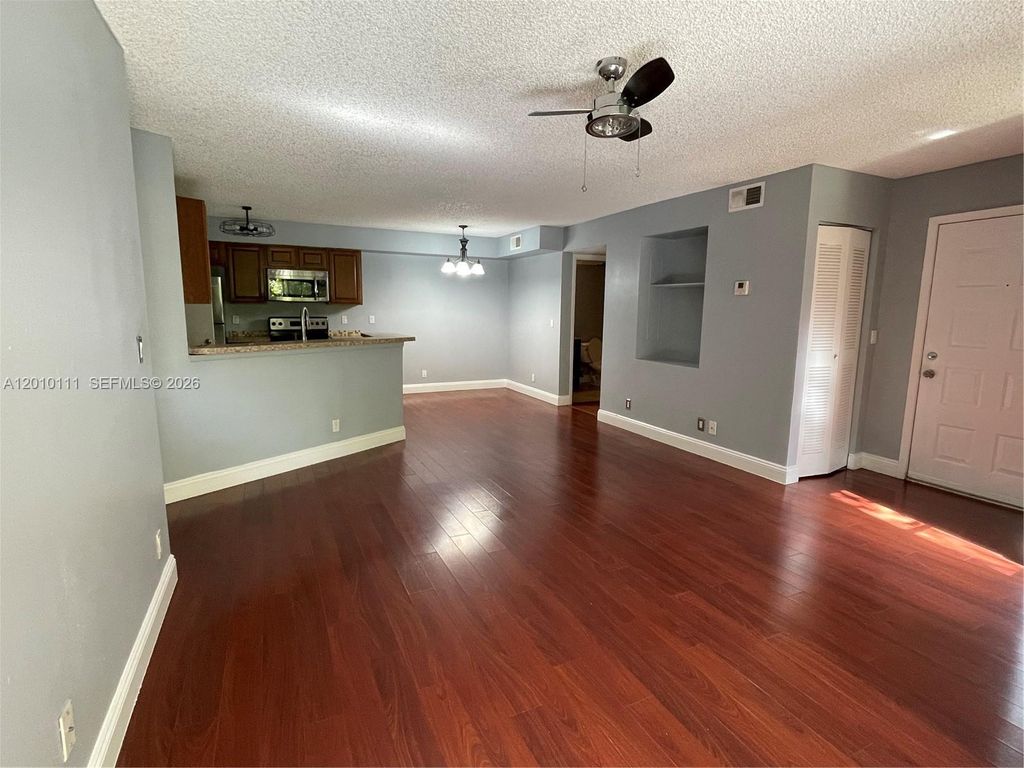 Photo of 9999 Summerbreeze Dr #717, Sunrise, FL 33322 (MLS # A12010111)