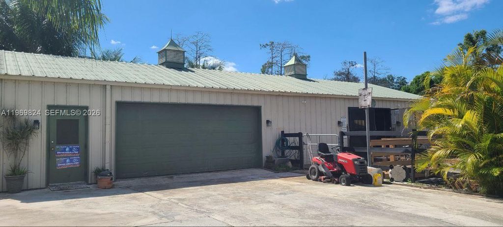 Photo of 10920 Barn Rd, Lake Worth, FL 33449 (MLS # A11969824)