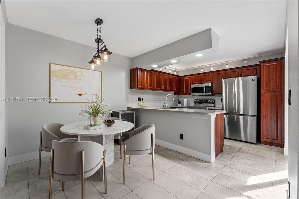 Photo of 11867 SW 13th Ct #11867, Davie, FL 33325 (MLS # A11931701)