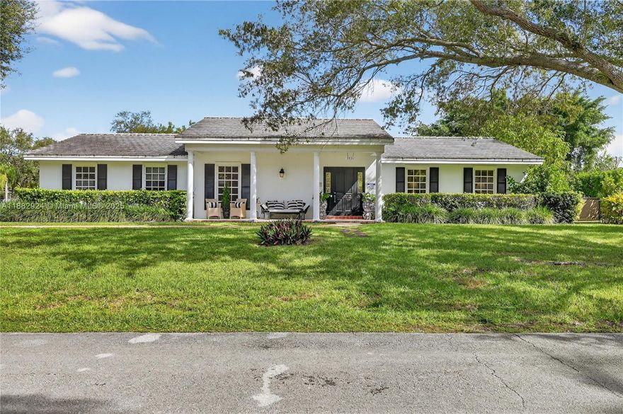 Welcome to experience Palmetto Bay at its finest. This colonial style 4/3 home is ready for its new owners . With fully renovated kitchen , with double oven, granite counter tops, stainless steel appliances and hardwood floor. The elegant dining room with gorgeous wallpaper over looking at the large covered terrace overlooking the updated pool and lavish landscaped fenced garden . 
Master bathroom with double sink walking closet , jacuzzi tub and bidet integrated toilet . 
Plenty of closet space throughout the home .
Large tiled porcelain flooring . New 5ton ac unit , 2 1/5 car garage . This corner home is move in ready and if needed to expand , the choices are endless with its large corner lot . The quiet street for families to enjoy  , the A rated schools its a win win !!