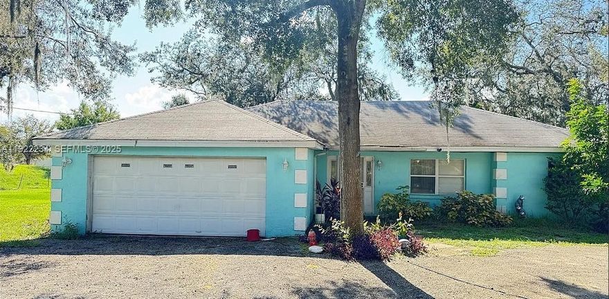 Land Space and Serenity on 1.24 Acres! 3 bedrooms, 2 bathrooms 2-car garage, workshop, shed, and carport, vaulted ceiling and tile floors, no homeowner's association (HOA). Open living room with plenty of space, master bathroom with jetted tub and walk-in shower, roof replaced in 2018, AC about 4 years old. This property includes a generous tool shed and workshop area, perfect for handymen or DIY enthusiasts. Serene surroundings with trees providing shade and privacy. Close to Lake Istokpoga for fishing enthusiasts. Nearby NASCAR Sebring International Raceway, Conveniently located near US 27, shopping, golf course, restaurants, schools, downtown, NASCAR race track, and Orlando's top attractions like Disney and Legoland!. close to both East and West coast beaches!  Motivated Seller bring your offer today.