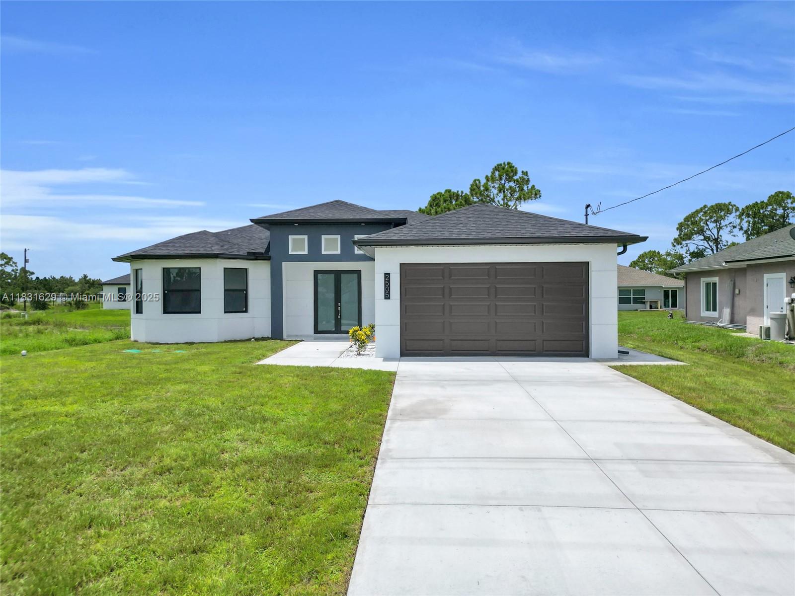 Seller is offering $10,000 toward buyer’s closing costs and prepaid items!
Take advantage of this incredible incentive to save on upfront expenses and make your move-in even easier. Don’t miss this opportunity
Elegant new construction in Lehigh Acres – 4 beds 2 baths Featuring four bedrooms, including a master suite with private bath, dual sinks, and wood cabinetry, plus a second full bath. The open layout is bright with natural light on sleek tile floors, premium finishes, and built-in wood cabinets in kitchen and baths. An indoor laundry room and impact-resistant windows and doors add convenience and efficiency. The attached two-car garage has an epoxy-coated floor for a clean, durable finish. A generous lot offers space for entertaining, gardening, or future pool/patio.