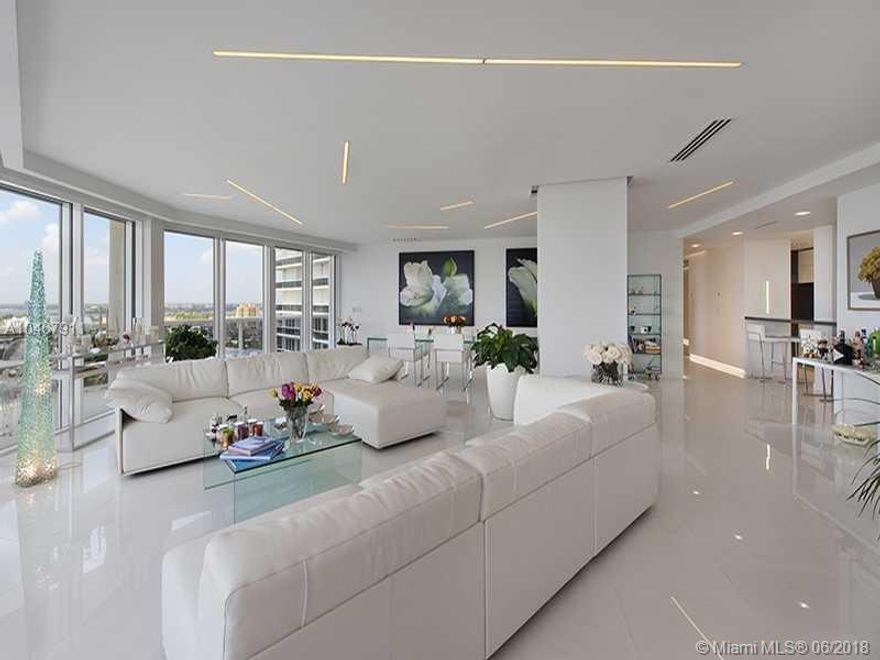 Showstopper- 4 Bedroom Penthouse high in Bal Harbour Sky, offering the best unobstructed views of the Intracoastal water and the Sunset over Miami Skyline and partial ocean This impeccable ulta-modern all white Italian Design masterwork offers no less than perfection to its smallest detail.  From sleek profile Rimadesio doors to Antonio Lupi signature bathrooms.  Immaculate extra-large white Granite Flandre porcelain flooring and Bisazza mosaics in baths.  Lutron lighting & Savant Sound system w/invisible speakers hidden in the ceiling. Excluding all art work.