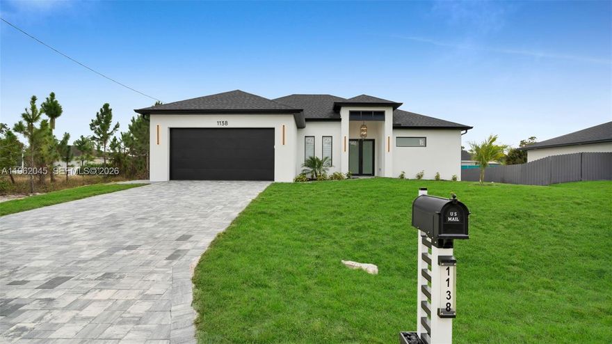 New Construction 2026. Beautiful move-in ready home located in a rapidly growing area of Lehigh Acres, ideal for buyers seeking comfort today and long-term value appreciation. This modern residence features 11-foot ceilings that provide spacious living areas, excellent natural light, and a contemporary design. The home offers a modern kitchen, ready-to-use closets, installed blinds, and elegant finishes throughout, making it a true turnkey property just bring your clothes and start enjoying. Includes a summer kitchen with grill, perfect for entertaining family and friends. Built to today’s standards, this property combines style, functionality, and strong investment potential in one of the most promising areas of Lehigh Acres. Ideal as a primary residence or investment property. Schedule your showing today.